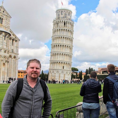 Dean Usher visting the Leaning Tower of Pisa in Italy