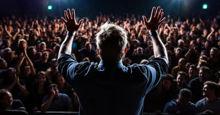 Person talking to an audience and getting a good response